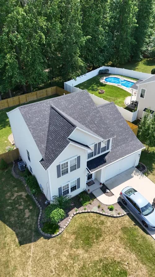 Blue Roofing and Gutters - Photo 1