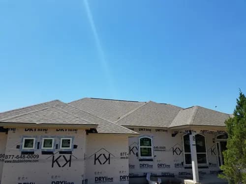 Cadillac Roofing - Photo 2