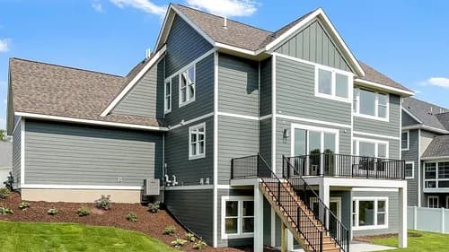 Custom One Exteriors - Photo 1