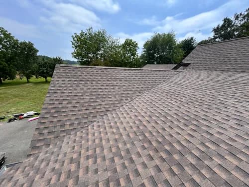 EMT Roofing & Siding - Photo 1