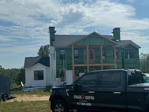 Grade A Roofing & Exteriors - Photo 1