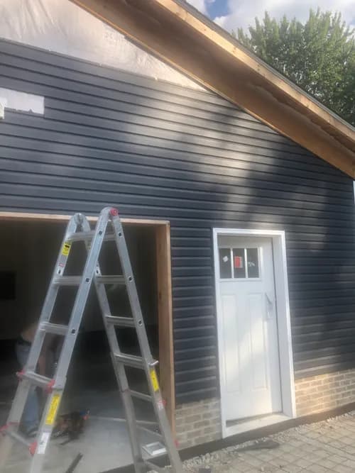 Home Genius Exteriors - Photo 5