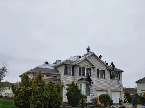 Iman Roofing - Photo 2