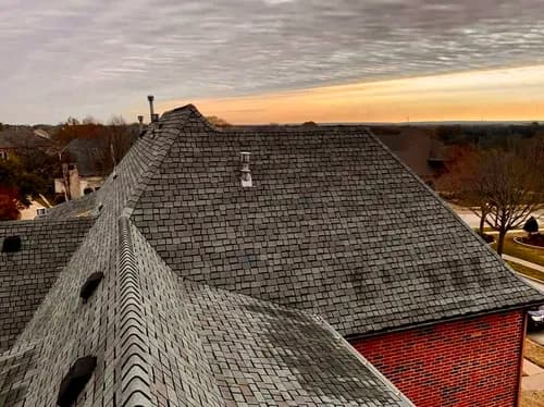 Invoke Roofing & Construction - Photo 2