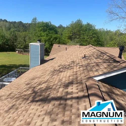 MagnumRoofs - Photo 1