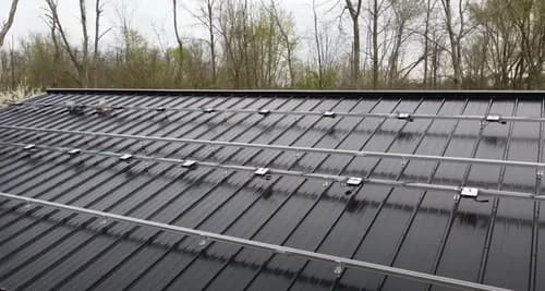 Mighty Metal Roofing - Photo 1