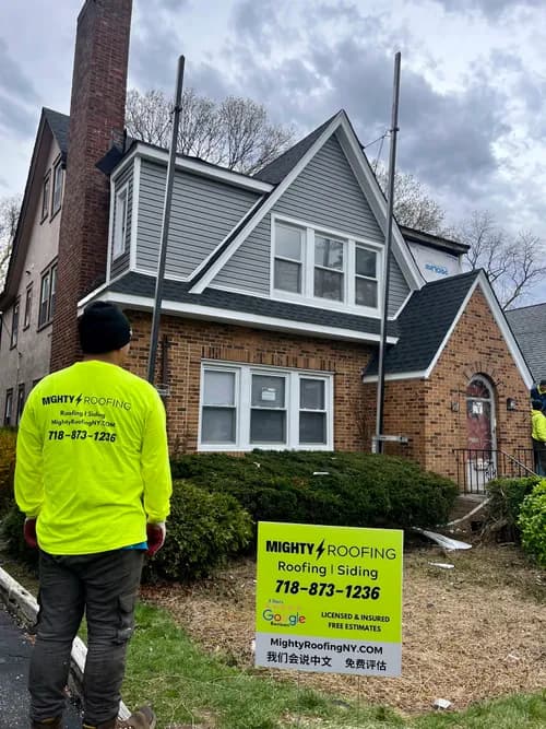 Mighty Roofing & Siding - Photo 1