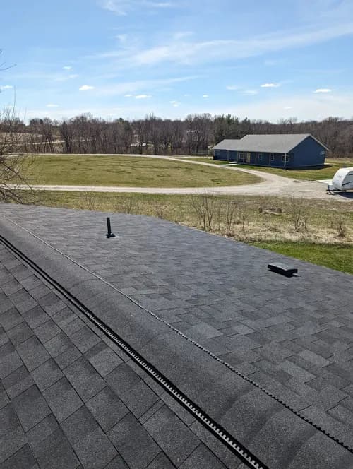 One and Done Roofing - Photo 3