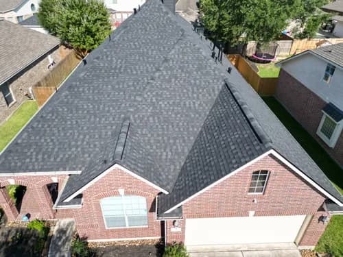 Over The Top Roofing - Photo 4