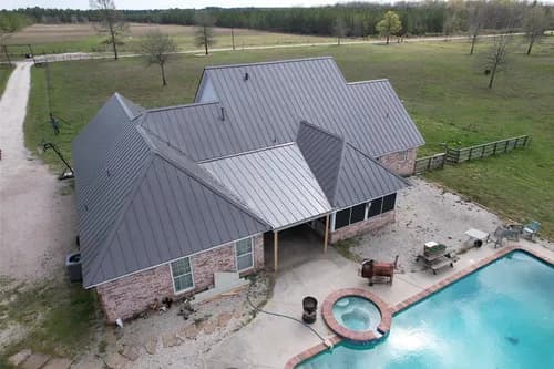 Over The Top Roofing - Photo 2