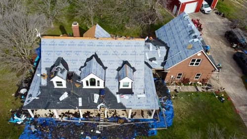 Qualis Roofing & Construction - Photo 1