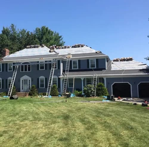 Rabbit Roofing & Restoration - Photo 1