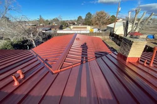 Reliance Metal Roofing - Photo 1