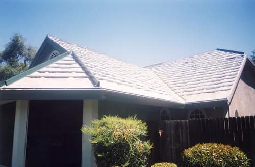 T K Roofing Inc