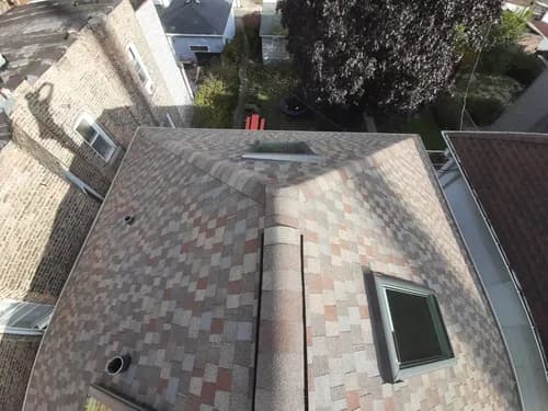 Tans' Quality Roofing - Photo 2