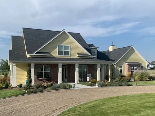 The Roofing Center - Photo 1