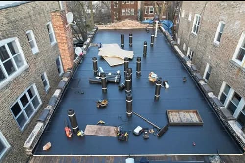 TMT Roofing - Photo 1