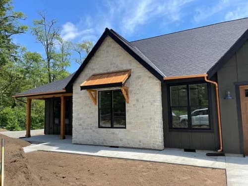 Unique Roofing Solutions - Photo 1