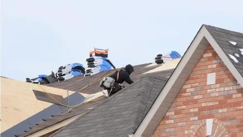 Any Weather Roofing - Photo 1