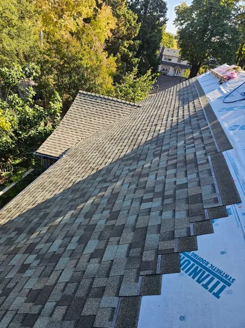 Between The Cracks Construction and Roofing - Photo 1