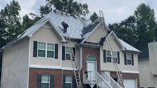 Champion Contracting Roofing - Photo 1