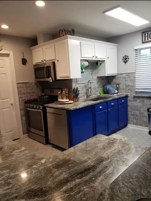 Down 2 Earth Roofing and Remodeling - Photo 1