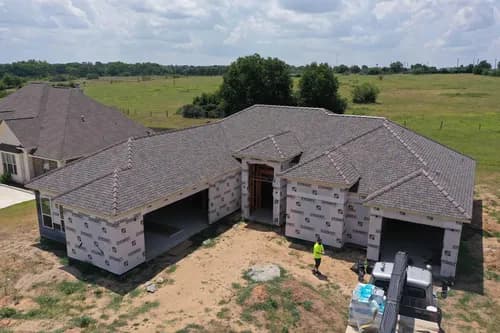 Exquisite Roofing - Photo 1