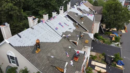 Exquisite Roofing - Photo 1