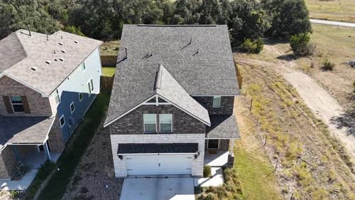 Grizzly Roofing and Construction - Photo 2