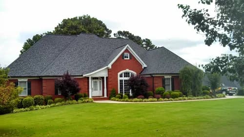 Mighty Dog Roofing - Photo 1