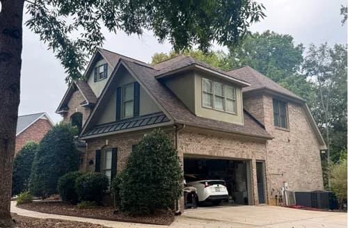 Rumble Bee Roofing and Gutters - Photo 1