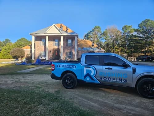 Rushing Roofing - Photo 1