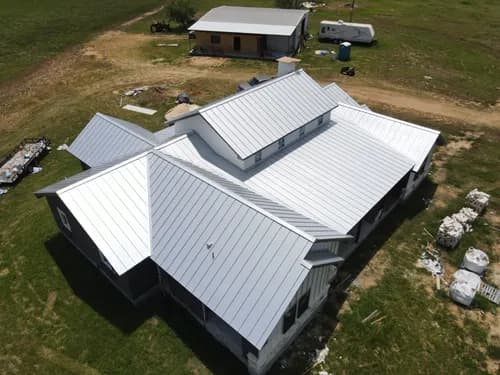 tm's quality metal roofing - Photo 1