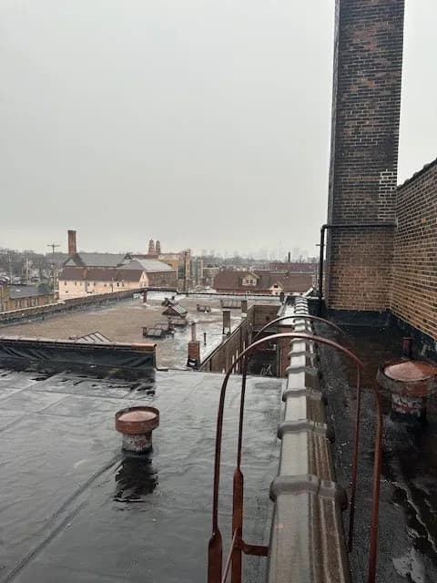 Top Level Roofing & Construction - Photo 1