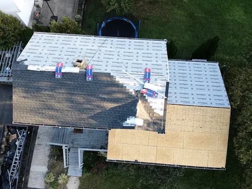 Wallace Roofing siding gutter sign window commercial residential flat metal asphalt shingle drywall insulation repairs - Photo 3