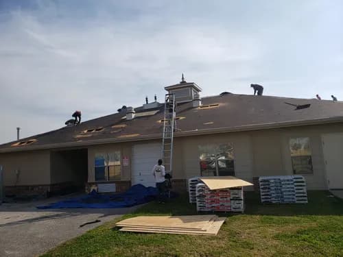 Wells & Sons Roofing - Photo 1