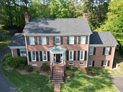 Wilson and Sons Roofing - Photo 1